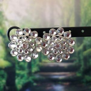 Large flower shaped silver studs